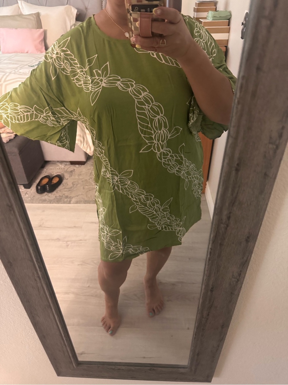 Olive Green Floral Dress/Cover-up, has pockets and slits on the side.